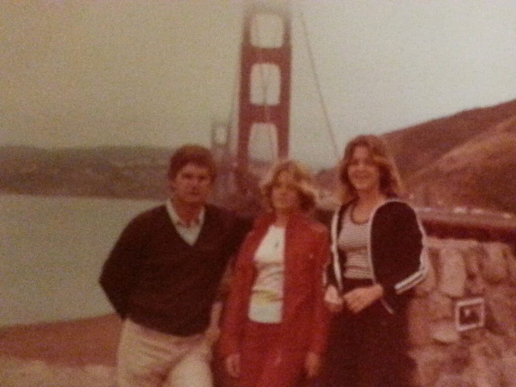 two girls and father at golden gate bridge. the beginning of nomad life!